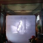 Gallery 1 - Screening of a silent film in the formal parlor of the Whaley Historic House Museum